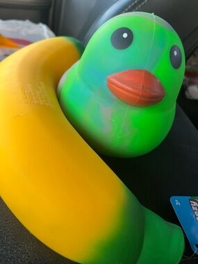 Green Rubber Duck Squeezy with Orange Beak and Yellow Banana Squeezy. Set of 2